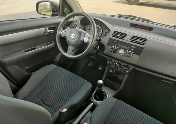 Suzuki Swift cena 13900 przebieg: 170675, rok produkcji 2009 z Zambrów małe 407